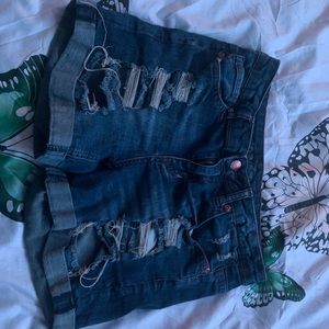 ripped Jean shorts.